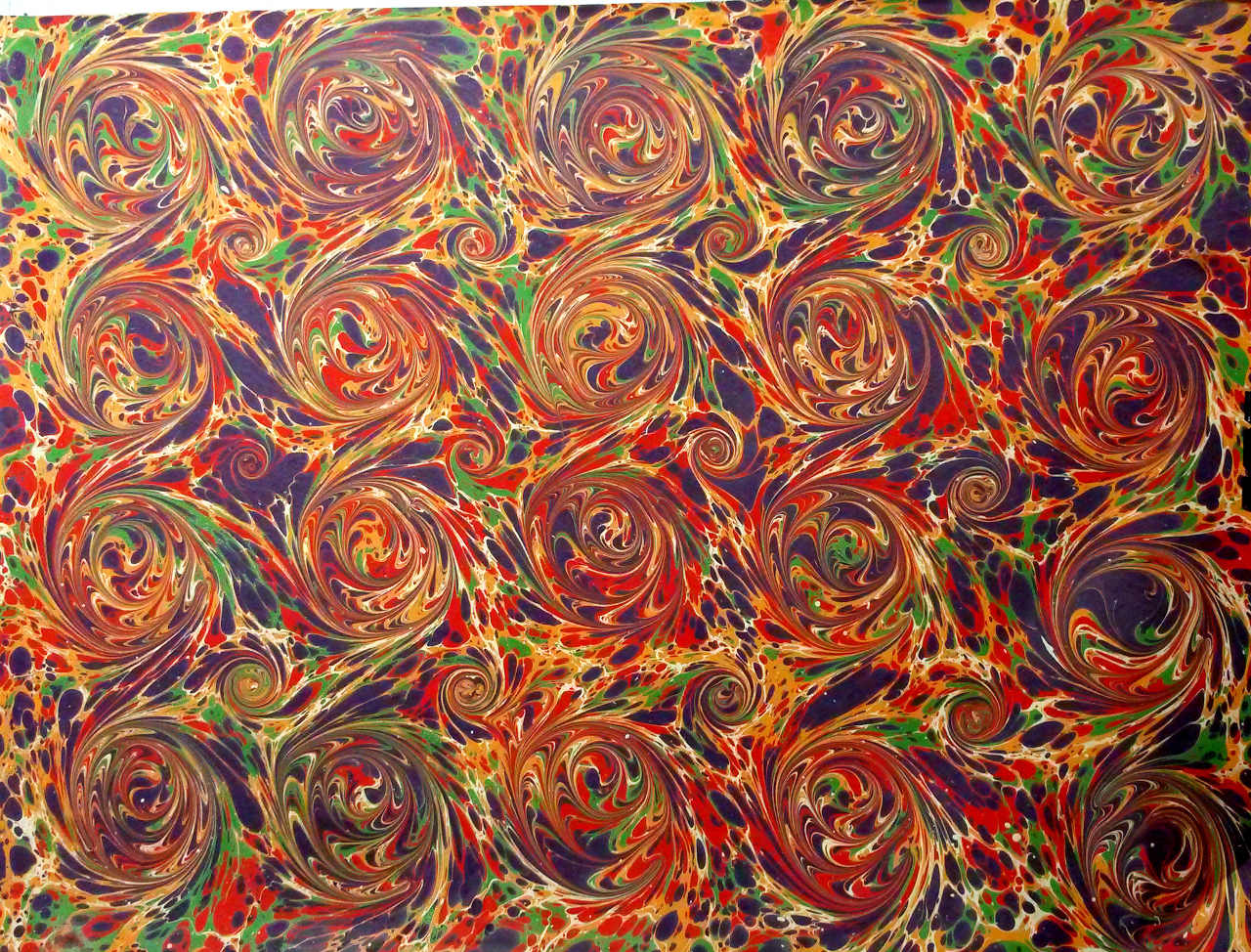 Combed marbling pattern in orange and blue